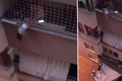 Balkonda korku dolu anlar: Düşmesin diye dakikalarca tuttu