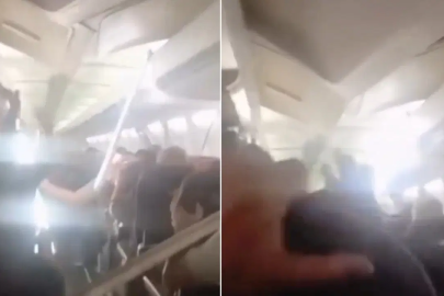 Yolcu uçağında korku dolu anlar. Kabin tavanı çöktü
